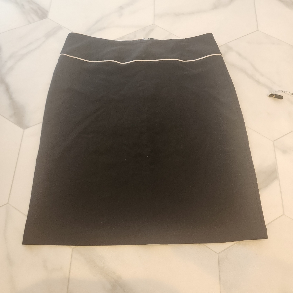 Womens, size Medium Speecless , black midi skirt, with white trim.